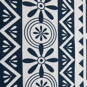 Bohemian blue and white geometric floral print curtain with ethnic fringe details