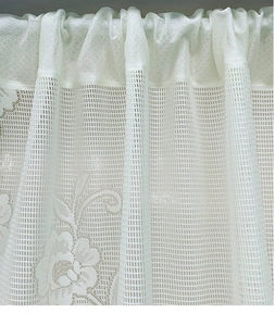 Close-up of white lace Roman curtain with delicate rose jacquard patterns and rod pocket