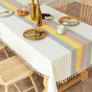 Nordic striped linen tablecloth with colorful vertical bands and white cotton fringe