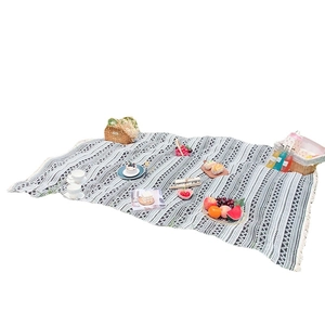 Bohemian geometric picnic mat with tassels for outdoor camping and leisure use