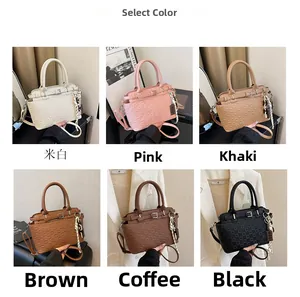 Matrix showing six colors of embossed leather tote bags with decorative charms