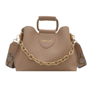 Fashionable beige crossbody handbag with metal handle and wide geometric strap for women