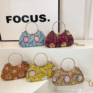 Sequin floral evening clutch bags with round metal handles in five vintage colors