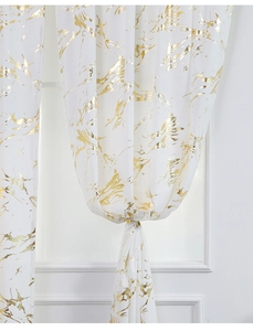 Close-up of modern white velvet curtain with luxury gold foil marble pattern texture
