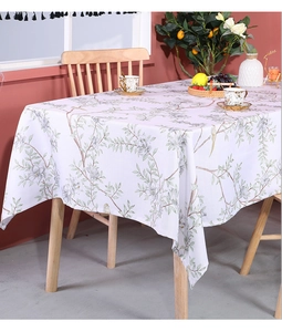Detailed close-up of botanical bird print on rectangular cotton linen tablecloth