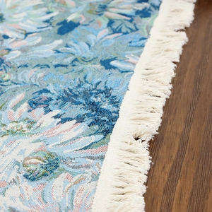 Blue American oil painting floral table runner with white fringe on dark wood