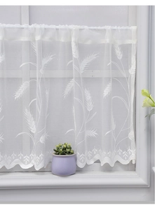 Detailed view of white lace coffee curtain with wheat embroidery and scalloped edges