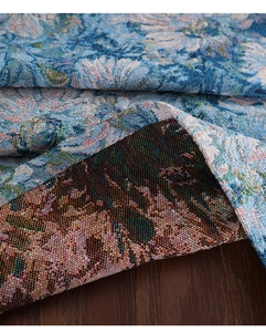 Close-up of double-sided jacquard floral tablecloth with thick woven texture and tassels