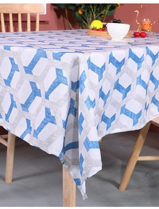 Close-up of blue and grey geometric Y-pattern on thick linen cotton tablecloth