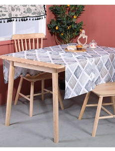Detail of Nordic geometric diamond pattern on thick cotton linen rectangular tablecloth