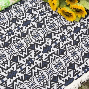 Bohemian geometric picnic blanket with white fringe tassels for outdoor camping decor