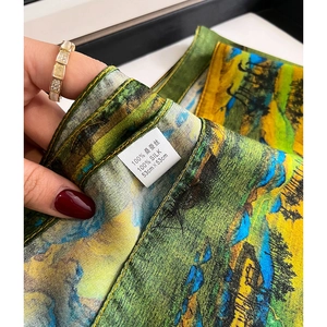 Silk square scarf featuring oil painting landscape print and hand-rolled edge finish