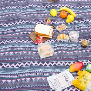 Bohemian geometric picnic blanket with purple and blue ethnic woven patterns for camping