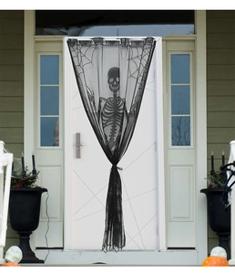 Detail of black Halloween mesh door curtain featuring white skeleton and spider web patterns