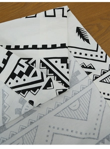 Detail of bohemian black and white geometric pattern on premium cotton linen fabric