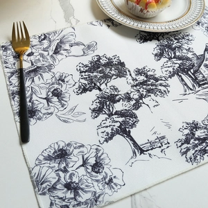 Waterproof linen dining mat with floral patterns and water droplet on marble table