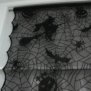 Black lace Halloween curtain featuring spider webs, flying witches, and bats for window decor