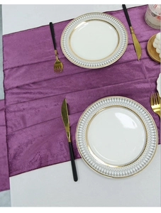 Close-up of purple velvet table runner with high-end texture for elegant dining setting
