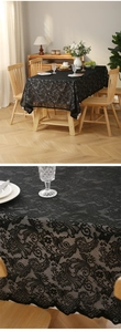 Gros plan sur une nappe en dentelle noire élégante avec des motifs floraux vintage