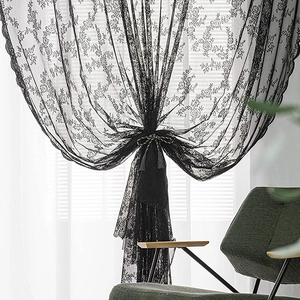 Elegant black lace curtain with floral embroidery and tassel tieback for home decor
