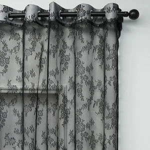 Retro black lace curtain with rose floral patterns and black grommets on a metal rod