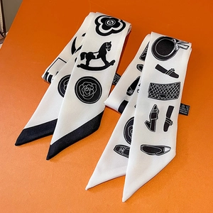 Classic black and white skinny silk scarves featuring camellia and luxury accessory prints