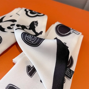 Elegant black and white twilly silk scarf with horse and camellia print on orange background