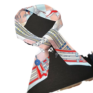 Elegant silk twilly scarf with chain print and multi-color geometric patterns for bags