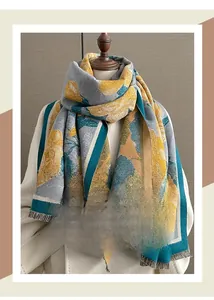 Detailed close-up of winter floral shawl with tassels and thick jacquard texture
