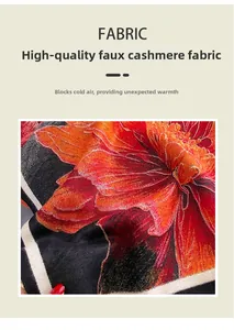 Detailed close-up of thick floral faux cashmere scarf fabric in red and orange tones