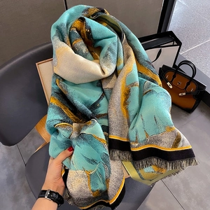 Thick winter cashmere-feel scarf for women with abstract art print and fringe details