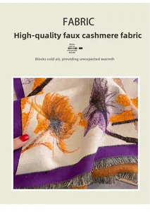 Detailed close-up of faux cashmere fabric with floral patterns and fine fringe trim
