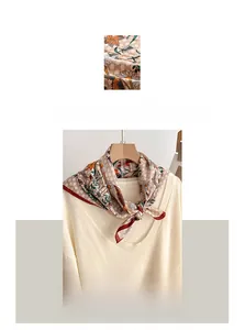 Detail of floral and checkered pattern cotton linen scarf with elegant burgundy border