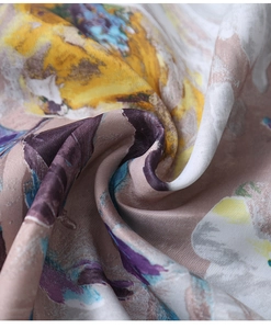 Close-up of waterproof abstract oil painting tablecloth with silky texture and vibrant floral print