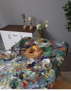 Detail of oil painting floral tablecloth with waterproof fabric and elegant draping