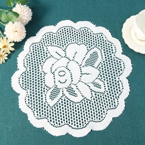 White crochet lace placemat with rose floral pattern for elegant dining table decor