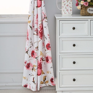 Detailed macro view of the Nordic floral print curtain fabric with soft rose patterns