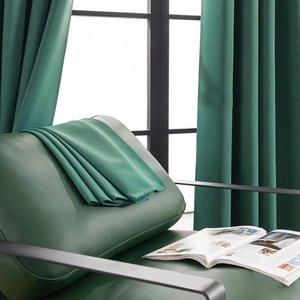 Modern solid emerald green blackout curtain with elegant drape for bedroom window
