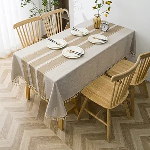 Nordic style striped linen tablecloth with white lace edges and decorative tassels