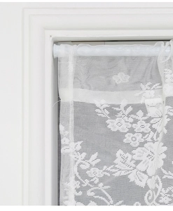 Close-up of white floral lace jacquard curtain with elegant sheer mesh texture details