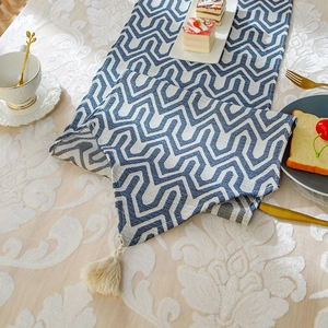 Blue and white wave pattern table runner with ivory tassels for modern home dining decor