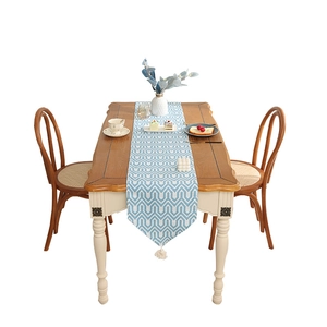 Blue and white chevron cotton linen table runner with elegant white tassels for dining decor