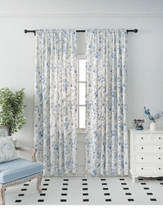 Detail of French floral cotton linen curtains with blue bird and botanical patterns
