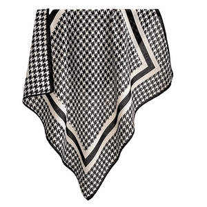 Elegant black and white houndstooth pattern scarf with black border on white background