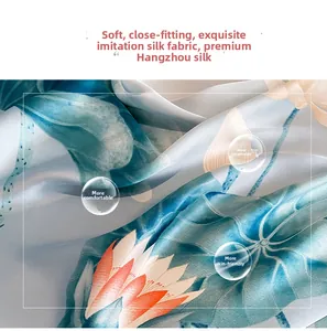 Detailed close-up of soft faux silk fabric featuring elegant lotus floral pattern