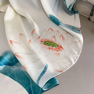 Elegant white silk scarf featuring lotus patterns and soft pink gradient petals