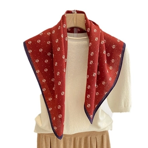 Elegant red square silk scarf with white leaf print and navy blue contrast borders