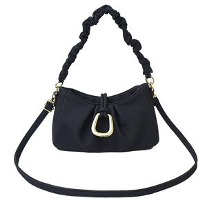 Minimalist black pleated cloud bag with elegant gold D-ring and crossbody strap