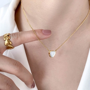 Elegant gold heart pendant necklace and multi-heart ring set with mother of pearl inlay