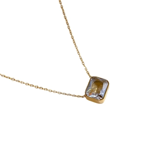 Elegant gold chain necklace featuring a minimalist square-cut zircon stone pendant